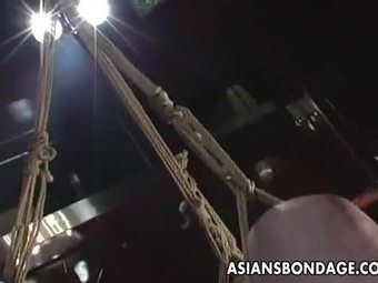 Tied up Asian babe treated to a complete bdsm session