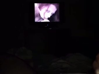 Jerking cock to porn cumshot